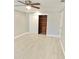 Bedroom with modern floors and built-in closet shelving at 8055 River Country Dr, Weeki Wachee, FL 34607