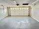 Spacious two car garage with overhead lighting at 8055 River Country Dr, Weeki Wachee, FL 34607