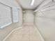 Spacious walk-in closet with custom shelving for ample storage and organization with a window at 8055 River Country Dr, Weeki Wachee, FL 34607
