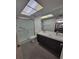 Bathroom has a double sink vanity, a sliding-door shower, and modern fixtures at 3233 Teeside Dr, New Port Richey, FL 34655