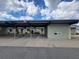 Exterior view showing the covered carport, offering convenient parking at 3233 Teeside Dr, New Port Richey, FL 34655