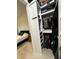 Convenient closet design with accessible shelves and hanging space, located adjacent to a bedroom at 435 Mcdill Dr, Port Charlotte, FL 33953
