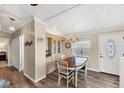 Bright dining area with wood table and built-in hutch at 1532 46Th Avenue E Dr, Ellenton, FL 34222
