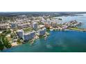 Aerial view of waterfront community with high rise buildings and boat docks at 1305 4Th St # 501C, Sarasota, FL 34236