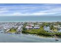 Coastal condominiums featuring water views, nearby tennis courts and a waterfront with boat access at 815 Bayport Way # 815, Longboat Key, FL 34228