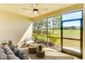 Relaxing lanai with golf course views, perfect for outdoor enjoyment at 12720 Sorrento Way # 102, Bradenton, FL 34211