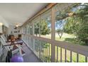 Screened lanai overlooking the lush golf course at 6736 Fairview Ter # 6736, Bradenton, FL 34203