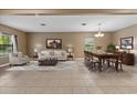 Spacious living and dining area with tile floors and neutral decor at 6309 75Th E Ave, Palmetto, FL 34221