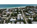 Aerial view showing home's location near beach and other houses at 4805 2Nd Ave, Holmes Beach, FL 34217