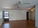 Spacious living room with wood flooring and a view of the back door at 4160 Fruitville Rd # 13, Sarasota, FL 34232