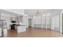 Bright kitchen with granite countertops and stainless steel appliances at 5901 Mariposa Ln, Sarasota, FL 34238