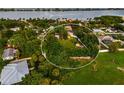 Aerial view showing home's location and large backyard at 329 Bay Vista Ave, Osprey, FL 34229