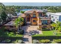 Luxury waterfront home with Spanish-style architecture at 1502 Siesta Dr, Sarasota, FL 34239