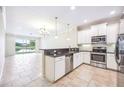 Modern kitchen with stainless steel appliances at 8106 Miramar Way, Lakewood Ranch, FL 34202