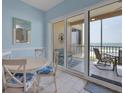 Bright dining area with ocean view at 1900 Gulf N Dr # 4, Bradenton Beach, FL 34217