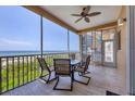 Relaxing screened balcony overlooking the ocean at 1900 Gulf N Dr # 4, Bradenton Beach, FL 34217