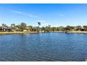 Scenic view of a tranquil lake in a residential community at 10622 Cheval Pl, Lakewood Ranch, FL 34202