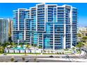 Luxury high-rise building with pool and city views at 1155 N Gulfstream Ave # 208, Sarasota, FL 34236