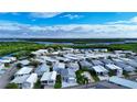 Aerial view of a mobile home community near the water at 3333 26Th E Ave # 1230, Bradenton, FL 34208