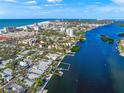 Aerial view of a waterfront home with private dock and amazing water views at 1358 Moonmist Dr # B4, Sarasota, FL 34242