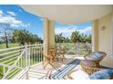 Relaxing balcony featuring comfortable seating and stunning views of the surrounding lush greenery at 7820 34Th W Ave # 102, Bradenton, FL 34209