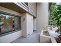 Condo exterior entrance with potted plants and walkway at 947 Sunridge Way # A-3, Sarasota, FL 34234