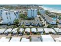 Aerial view of condo community near beach at 1048 W Peppertree Ln # 118B, Sarasota, FL 34242