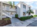 Condo building exterior showcasing entrance and landscaping at 5310 26Th W St # 2703, Bradenton, FL 34207