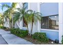 Condo building exterior, showcasing landscaping and building details at 5310 26Th W St # 2703, Bradenton, FL 34207