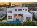 Luxury waterfront home showcasing a private pool and expansive rooftop deck at 1212 Center Pl, Sarasota, FL 34236