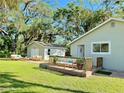 Spacious backyard with patio and detached garage at 1127 41St St, Sarasota, FL 34234