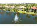 Aerial view of house and property; lakefront location at 7816 Crest Hammock Way, Sarasota, FL 34240