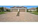 Two-car garage with paver driveway at 4734 Tortona Ct, Bradenton, FL 34211
