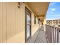 Building hallway with access to condo unit at 14459 River Beach Dr # 112, Port Charlotte, FL 33953