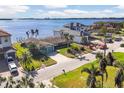 An aerial view showcasing a waterfront home and neighborhood at 1750 Southpointe Dr, Sarasota, FL 34231