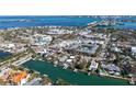 Property's aerial view shows a waterfront location near the city center and marina at 515 S Washington Dr, Sarasota, FL 34236