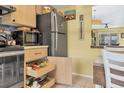 Well-organized kitchen with ample storage and modern conveniences at 2431 Golf Course Dr # 703, Sarasota, FL 34234