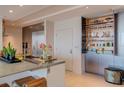 Modern kitchen with stainless steel appliances and open shelving at 1350 Main St # 600, Sarasota, FL 34236