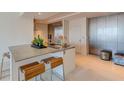 Modern kitchen with stainless steel appliances and an island at 1350 Main St # 600, Sarasota, FL 34236