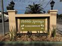 Pebble Springs Condominium sign with landscaping at 6312 7Th W Ave # 6312, Bradenton, FL 34209