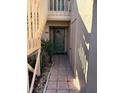 Inviting condo entryway with tiled flooring and a green door at 6312 7Th W Ave # 6312, Bradenton, FL 34209