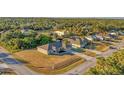 Aerial view showcasing home's curb appeal and neighborhood context at 5271 Beckham St, North Port, FL 34288