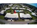 Aerial view of a community with a pool and villas at 7315 8Th W Ave # 7315, Bradenton, FL 34209