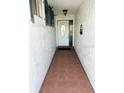 Bright entryway with tiled floors and a white door at 7315 8Th W Ave, Bradenton, FL 34209