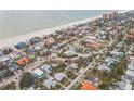 Aerial view of beach homes with a view of the Gulf of Mexico at 745 Bruce Ave, Clearwater Beach, FL 33767