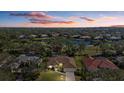 Luxury home on golf course with lake views and lush landscaping at 8111 Fairhaven Glen, University Park, FL 34201