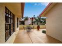 Spacious patio area with seating for enjoying the Florida sunshine at 6105 Courtside Dr, Bradenton, FL 34210