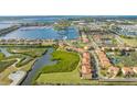 Aerial view of townhouses near marina, offering waterfront living and resort-style amenities at 1309 3Rd Street E Cir, Palmetto, FL 34221