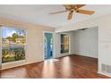 Living room with hardwood floors and ceiling fan at 4009 38Th Avenue W Dr # 4009, Bradenton, FL 34205