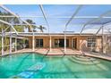 Inviting swimming pool with a fun inflatable raft at 322 Avenida De Paradisio, Sarasota, FL 34242